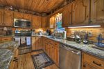 Kitchen with Stainless Steel Appliances with Granite Counter Tops